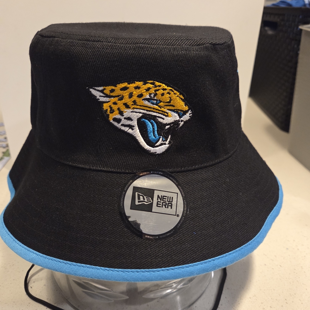 Jacksonville Jaguars New Era Black Bucket Hat.